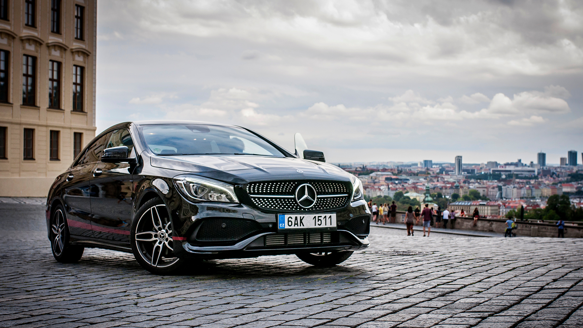 mercedez benz car parked on a city street