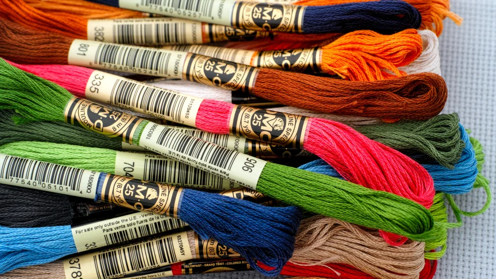 DMC threads in a stack of various colors