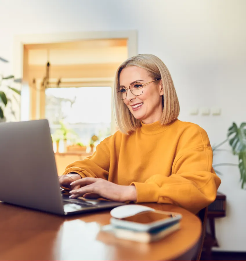 A visual of a marketer using a laptop