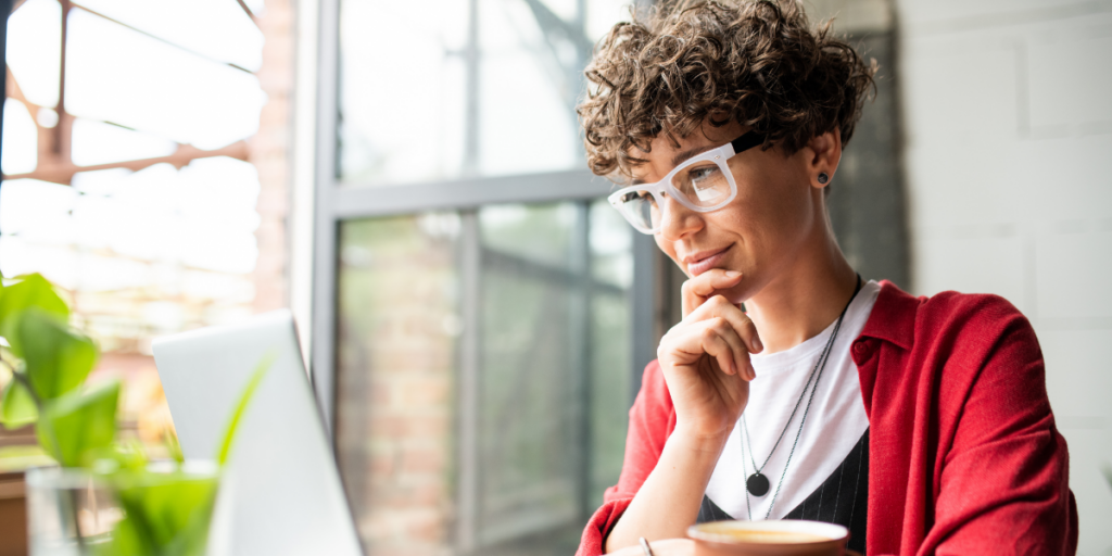 Person deep in thought as they examine their social listening dashboards